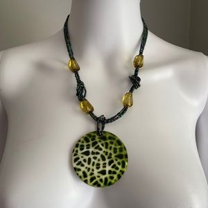 Three Strand Beaded Necklace with Shell Pendant